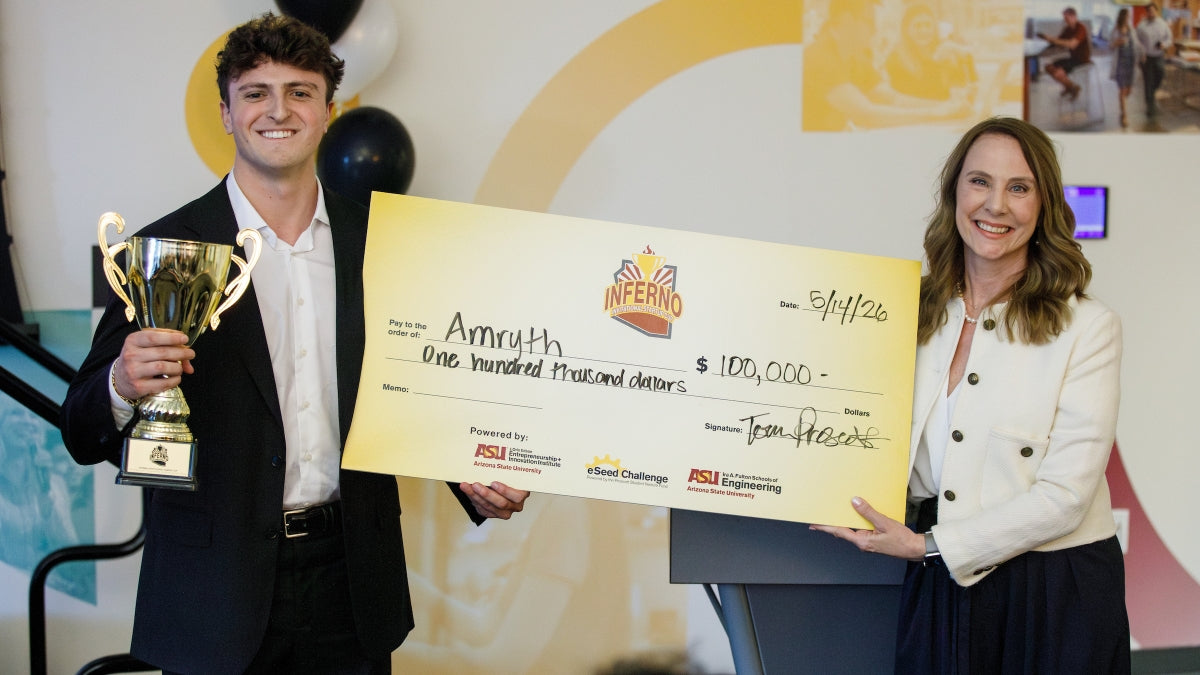 Logan Milano, winner of the Inferno Invitational Startup Cup, poses with Joy Griffen, faculty director of venture development for the Ira A. Fulton Schools of Engineering